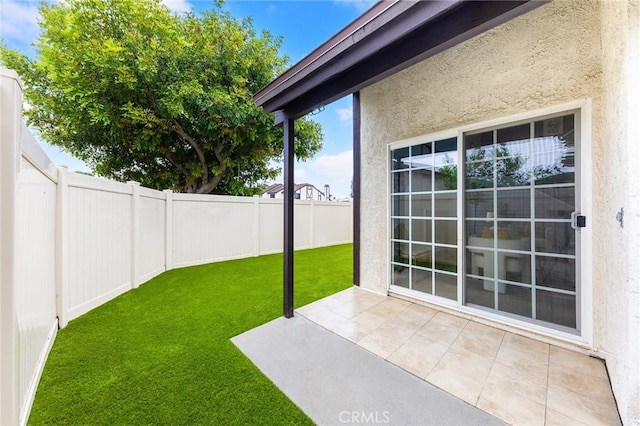 11636 Lambert Ave Unit 12, El Monte, CA 91732 - fenced backyard with a patio area
