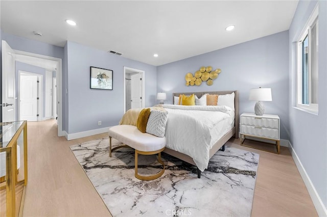11636 Lambert Ave Unit 12, El Monte, CA 91732 - bedroom with light wood-style flooring and recessed lighting