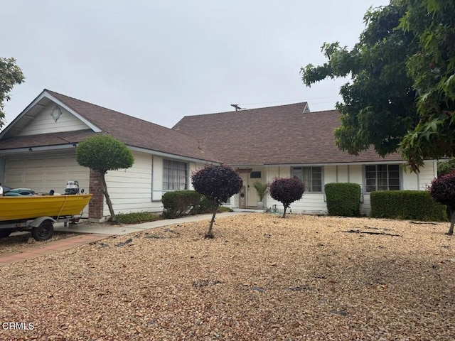 8223 Tiara St, Ventura, CA 93004 - ranch-style house featuring an attached garage and roof with shingles