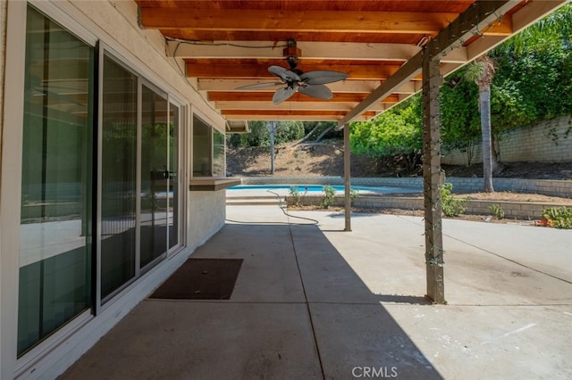 19941 Hiawatha St, Chatsworth, CA 91311 - fenced backyard featuring a ceiling fan and a patio