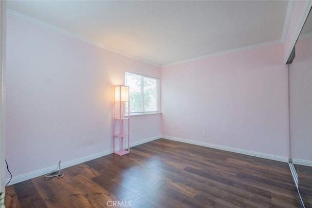 19941 Hiawatha St, Chatsworth, CA 91311 - unfurnished room with dark wood-style floors, baseboards, and ornamental molding