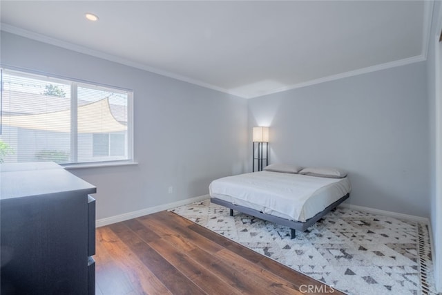19941 Hiawatha St, Chatsworth, CA 91311 - bedroom with ornamental molding, wood finished floors, baseboards, and recessed lighting
