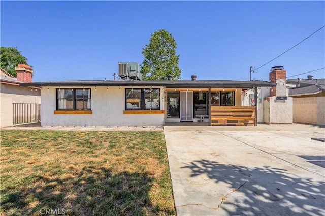 9551 Barkerville Ave, Whittier, CA 90605 - view of front of house featuring stucco siding and central air condition unit