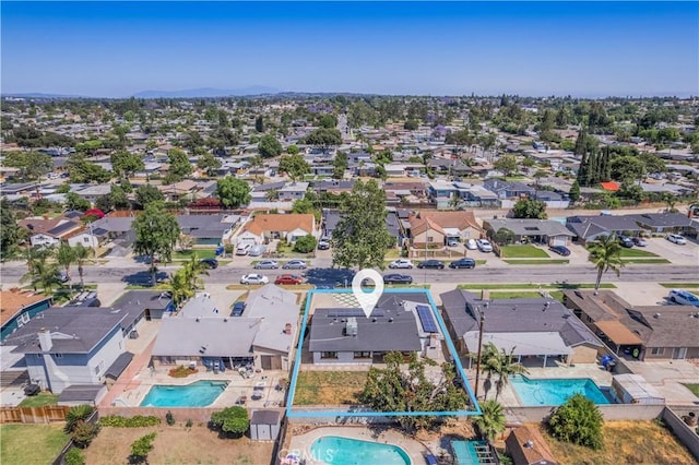 9551 Barkerville Ave, Whittier, CA 90605 - aerial perspective of suburban area featuring a pool area and property parcel outlined