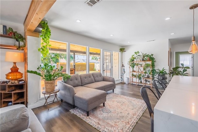 9551 Barkerville Ave, Whittier, CA 90605 - living area with dark wood-style flooring and recessed lighting