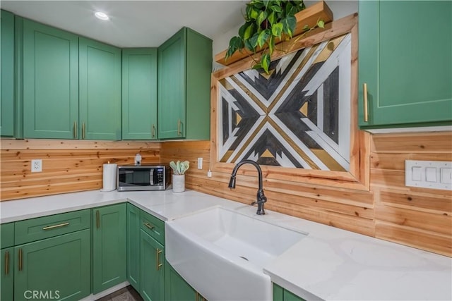 9551 Barkerville Ave, Whittier, CA 90605 - kitchen with a sink, stainless steel microwave, and green cabinets