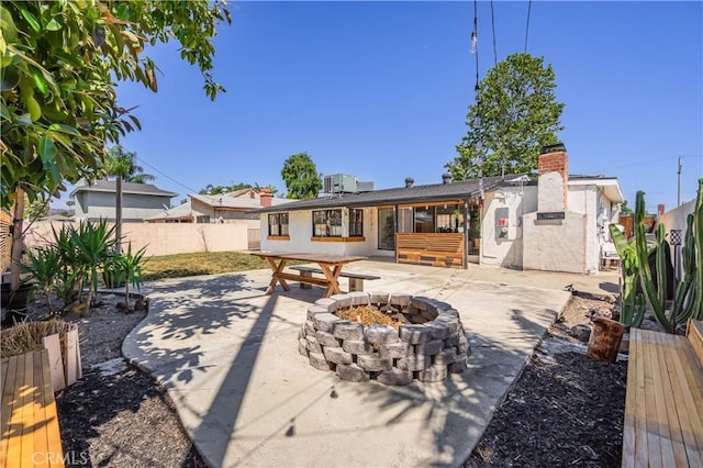 9551 Barkerville Ave, Whittier, CA 90605 - fenced backyard featuring a patio and an outdoor fire pit