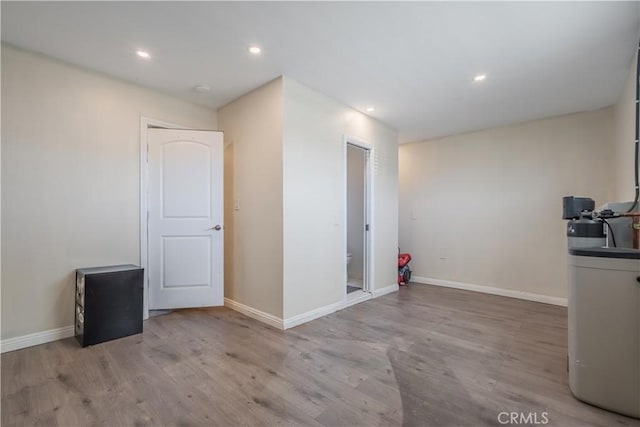 9551 Barkerville Ave, Whittier, CA 90605 - spare room with wood finished floors, baseboards, and recessed lighting