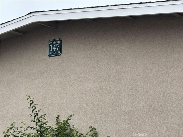 13540 Saint Andrews Dr Unit M14-4J, Seal Beach, CA 90740 - exterior view of stucco siding