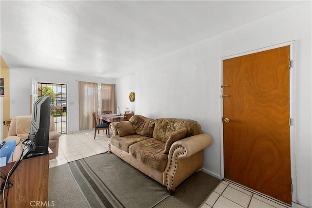 11909 Lowemont St, Norwalk, CA 90650 - living room featuring light tile patterned flooring