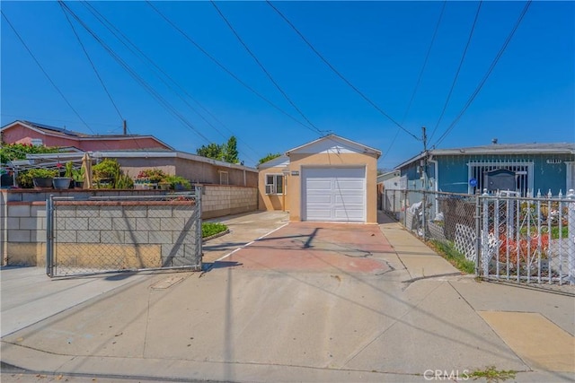 11909 Lowemont St, Norwalk, CA 90650 - ranch-style house with concrete driveway, an outdoor structure, and a detached garage