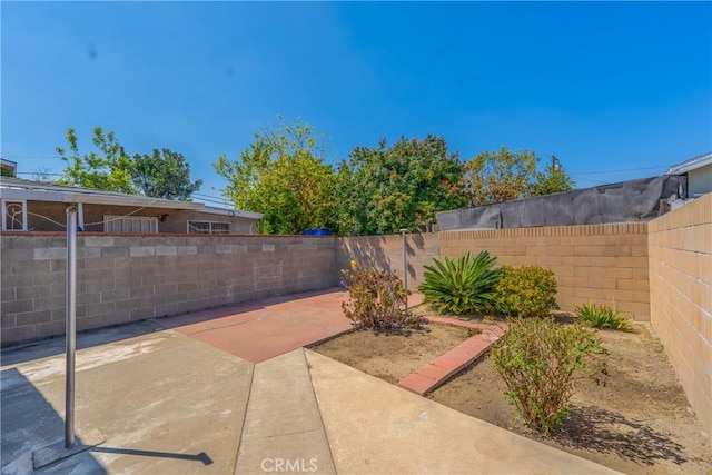11909 Lowemont St, Norwalk, CA 90650 - fenced backyard featuring a patio area