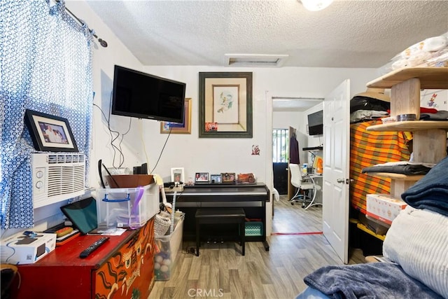 3339 E 4th St, Los Angeles, CA 90063 - living area with attic access, a textured ceiling, wood finished floors, and an office area