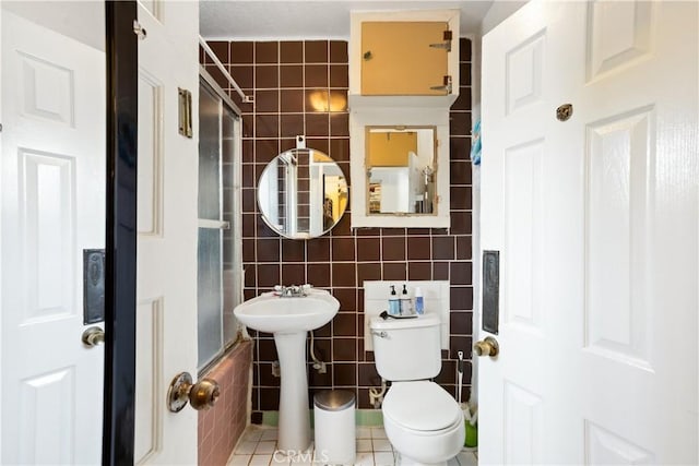 3339 E 4th St, Los Angeles, CA 90063 - bathroom featuring tile walls and toilet