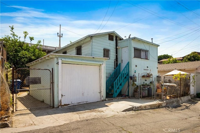 3339 E 4th St, Los Angeles, CA 90063 - view of front of home featuring a gate and a garage