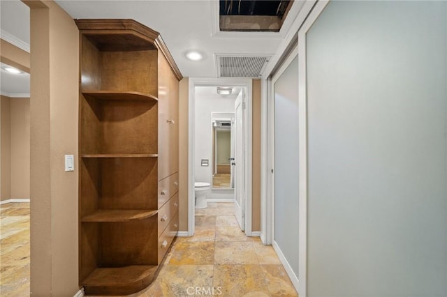 950 N Kings Rd Unit 160, West Hollywood, CA 90069 - corridor featuring stone tile floors and crown molding