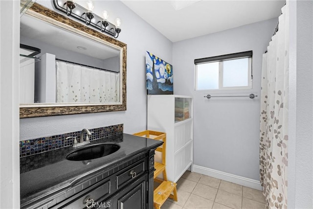5345 Kenwood Ave, Buena Park, CA 90621 - full bath with vanity, tile patterned flooring, and baseboards