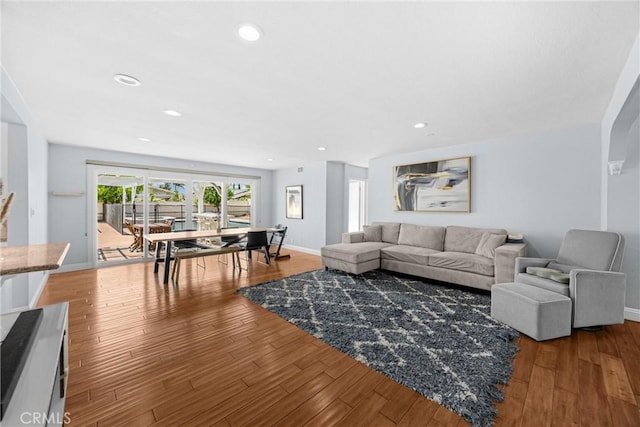 5345 Kenwood Ave, Buena Park, CA 90621 - living area featuring wood finished floors, baseboards, and recessed lighting