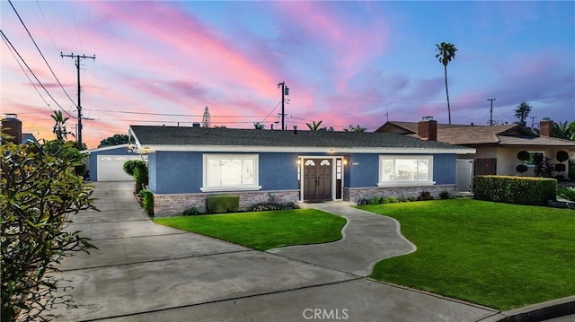 5345 Kenwood Ave, Buena Park, CA 90621 - single story home with stucco siding, a front yard, and stone siding