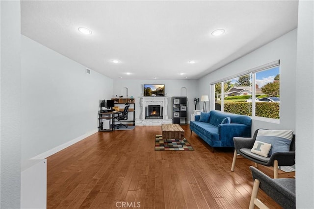 5345 Kenwood Ave, Buena Park, CA 90621 - living room with a fireplace, wood finished floors, recessed lighting, and baseboards