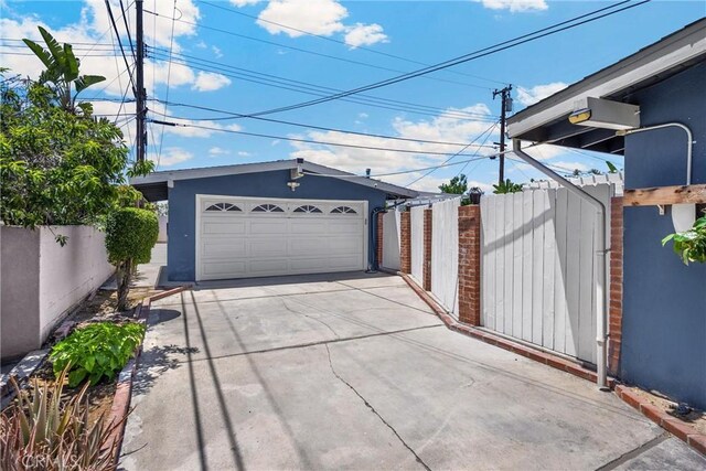 5345 Kenwood Ave, Buena Park, CA 90621 - garage with concrete driveway
