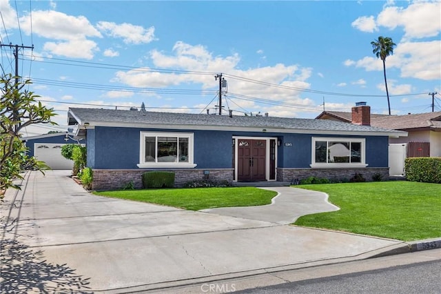 5345 Kenwood Ave, Buena Park, CA 90621 - ranch-style home with stucco siding, stone siding, and a front lawn