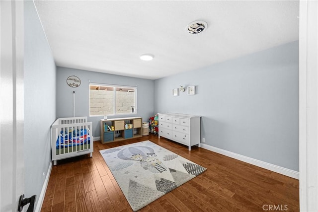 5345 Kenwood Ave, Buena Park, CA 90621 - bedroom featuring baseboards and wood finished floors