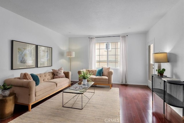 2750 Artesia Blvd Unit 337, Redondo Beach, CA 90278 - living area with dark wood-style floors and baseboards