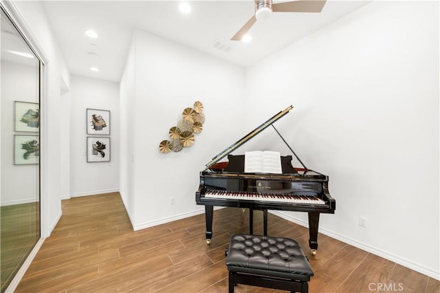 103 Sparrow, Irvine, CA 92618 - living area featuring wood finished floors, baseboards, ceiling fan, and recessed lighting