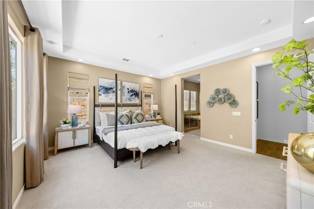 103 Sparrow, Irvine, CA 92618 - bedroom with a tray ceiling, light colored carpet, recessed lighting, baseboards, and ensuite bathroom