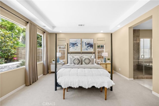 103 Sparrow, Irvine, CA 92618 - bedroom with light carpet, recessed lighting, a tray ceiling, baseboards, and ensuite bathroom