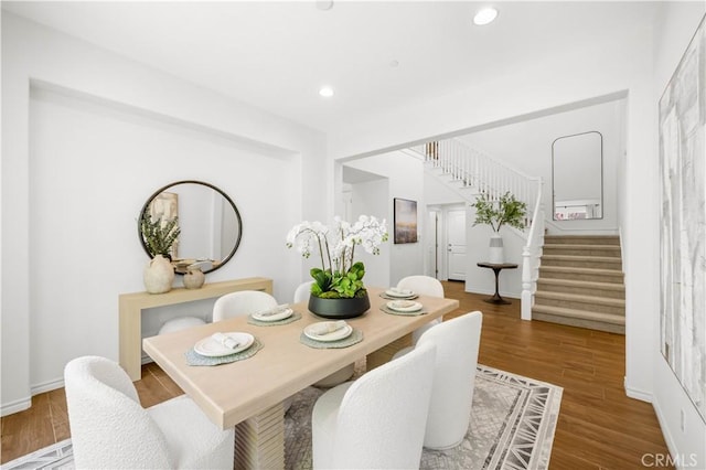 103 Sparrow, Irvine, CA 92618 - dining space featuring stairway, wood finished floors, recessed lighting, and baseboards