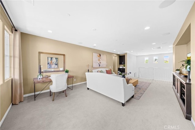 103 Sparrow, Irvine, CA 92618 - living room featuring light carpet, recessed lighting, and baseboards