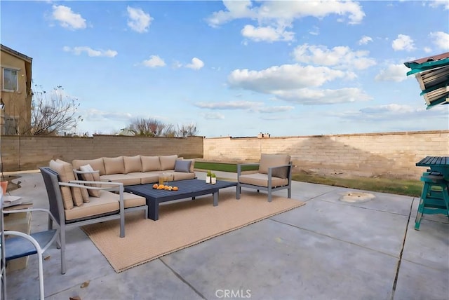 2123 Coconut Pl, Palmdale, CA 93551 - fenced backyard featuring an outdoor living space and a patio area