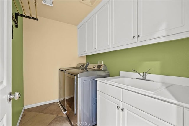 2123 Coconut Pl, Palmdale, CA 93551 - laundry room with washing machine and clothes dryer and cabinet space