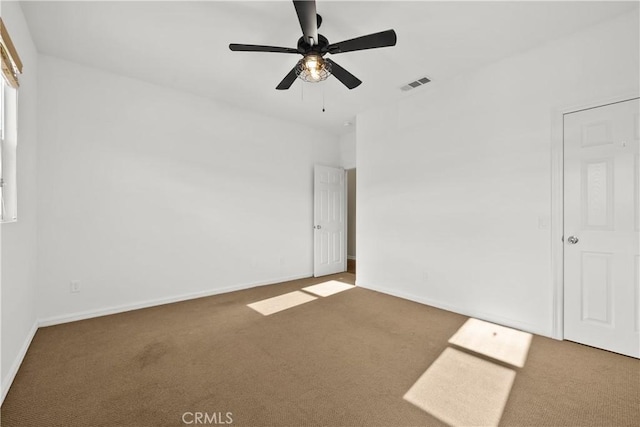 2123 Coconut Pl, Palmdale, CA 93551 - carpeted empty room with baseboards and a ceiling fan