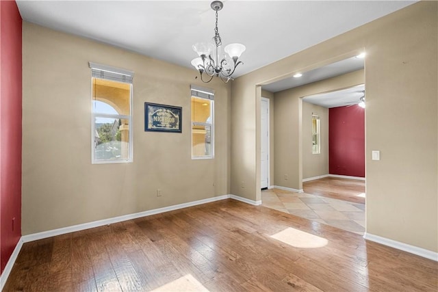 2123 Coconut Pl, Palmdale, CA 93551 - unfurnished room featuring light wood-style flooring and a chandelier