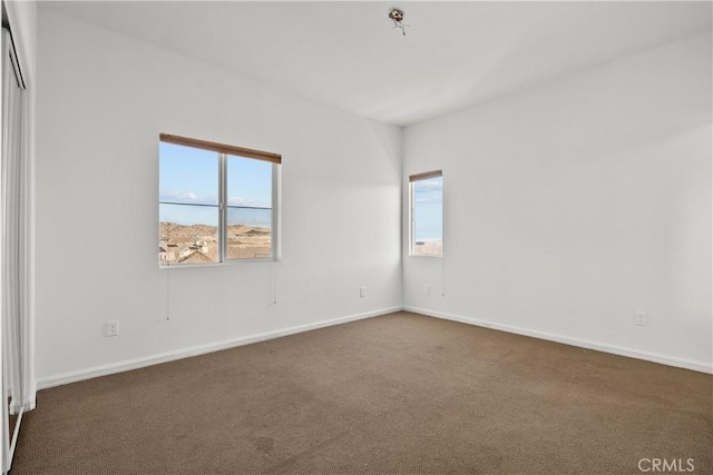 2123 Coconut Pl, Palmdale, CA 93551 - carpeted empty room featuring baseboards
