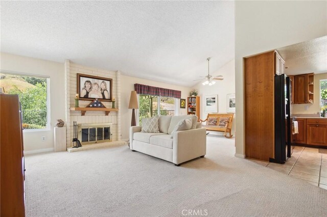 2482 Limestone Ct, Chino Hills, CA 91709 - living area with a textured ceiling, plenty of natural light, light carpet, and high vaulted ceiling