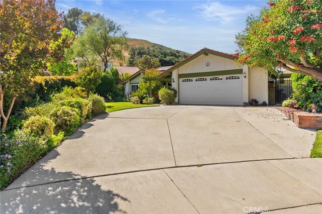 2482 Limestone Ct, Chino Hills, CA 91709 - view of front of property featuring an attached garage and driveway