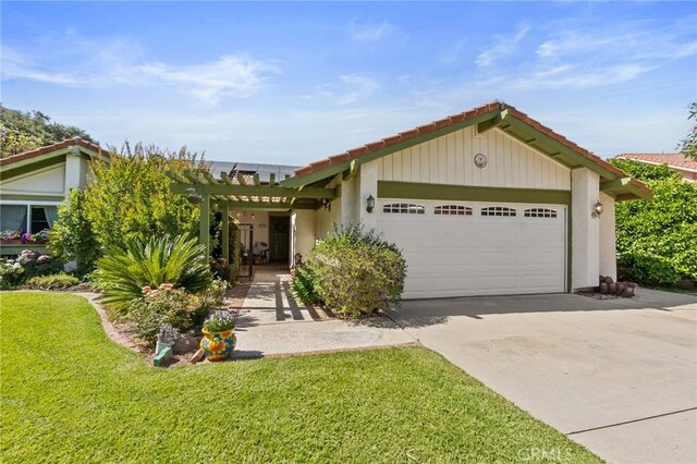 2482 Limestone Ct, Chino Hills, CA 91709 - view of front of house with an attached garage, a front lawn, concrete driveway, a tile roof, and stucco siding