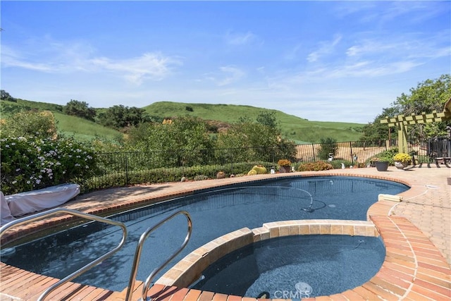2482 Limestone Ct, Chino Hills, CA 91709 - view of swimming pool featuring a mountain view and a pool with connected hot tub