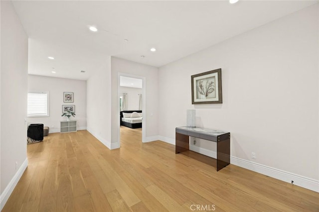 1279 Waterbrook Cir, Walnut, CA 91789 - hall featuring light wood-type flooring, baseboards, and recessed lighting