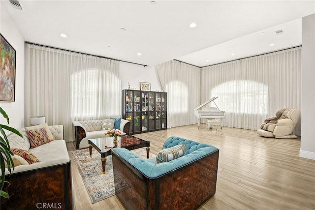 1279 Waterbrook Cir, Walnut, CA 91789 - living area with wood finished floors, healthy amount of natural light, and recessed lighting