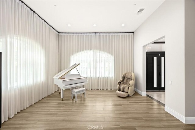 1279 Waterbrook Cir, Walnut, CA 91789 - living area featuring light wood-type flooring and baseboards