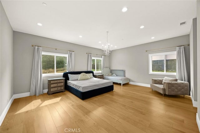 1279 Waterbrook Cir, Walnut, CA 91789 - bedroom with a chandelier, light wood finished floors, baseboards, and recessed lighting