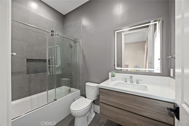 1279 Waterbrook Cir, Walnut, CA 91789 - bathroom with vanity, toilet, and bath / shower combo with glass door