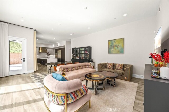 1279 Waterbrook Cir, Walnut, CA 91789 - living area with light wood-type flooring, baseboards, and recessed lighting