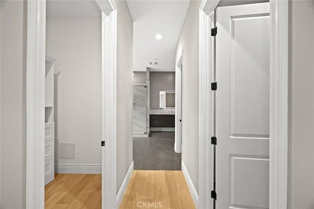 1279 Waterbrook Cir, Walnut, CA 91789 - corridor with light wood-style floors, baseboards, and recessed lighting