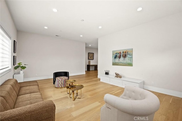 1279 Waterbrook Cir, Walnut, CA 91789 - living area featuring light wood-type flooring, recessed lighting, and baseboards